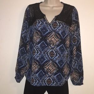 Size S.  Long sleeve blouse.